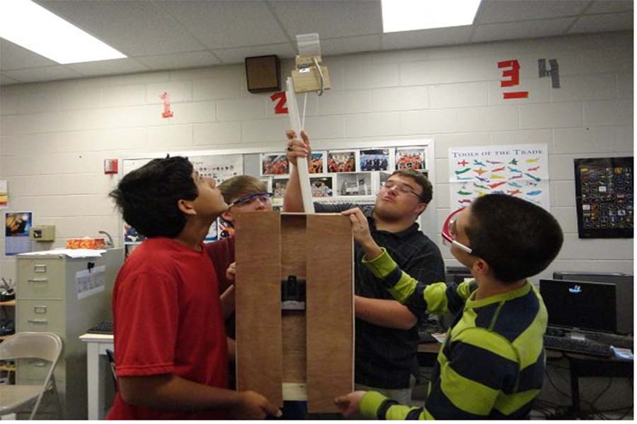 Bob Jones Students Assembling the Robot