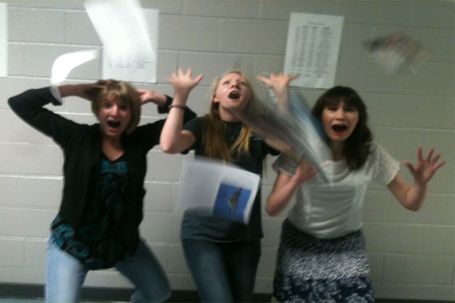 (From left to right) Maria Sullivan, Xandra Wiegand, and Caroline Robinson panic as applications fall from the heavens.