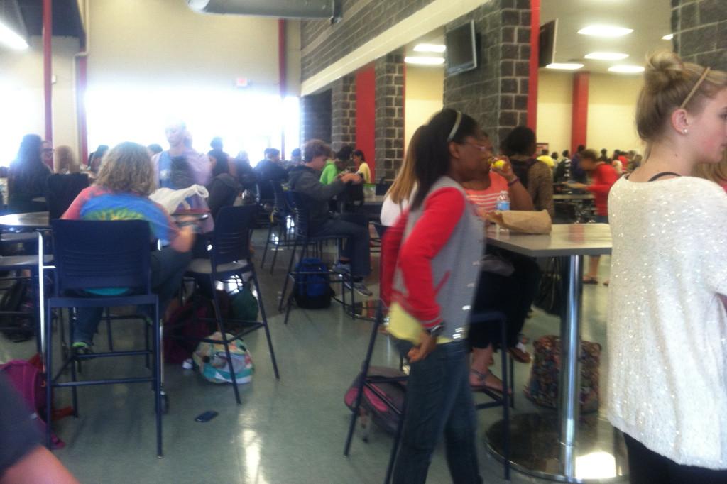 Students enjoy the new tables in the lunch room.
