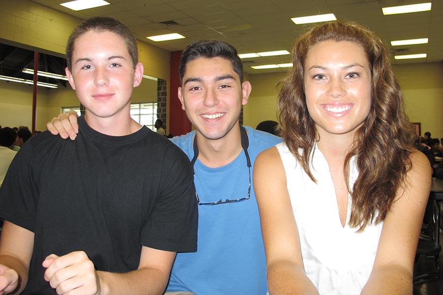 Peer Helpers Carla Mersereau and Brian Tachias sit with new student, Matthew Howell during lunch. 