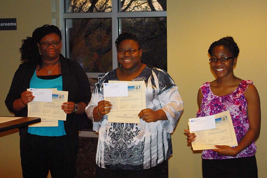 Alyssa Kennedy, Khadijah Thompson, and Nkechi Nnorom were recognized for winning the 2014 Optimist Club of Madison Essay Contest. 