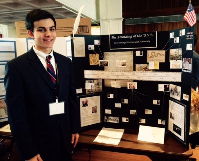 Jordan with his presentation at the MIT INSPIRE competition. 