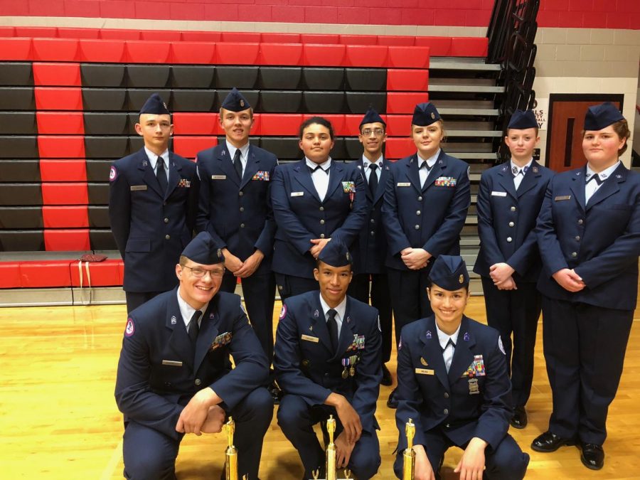 This is the drill team at Hazel Green on December 2, 2017 with their trophies