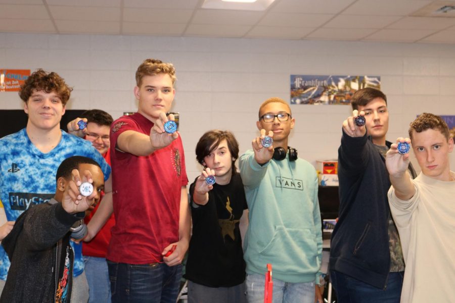 Students showing off their Beyblades.