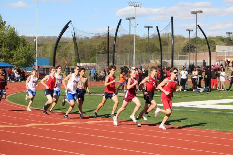 In the first lap of the 1600, Caleb Johnson (09), Luke Allen (09), and Eric Joy (09) pack together. Eric Joy PRd by a second in the race. “Honestly, doing well and improving is my favorite part of track. I know that’s kind of basic, but it takes a lot of work to improve, so it’s gratifying,” said Joy.