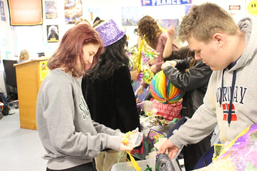 Students decorate for Mardi Gras.