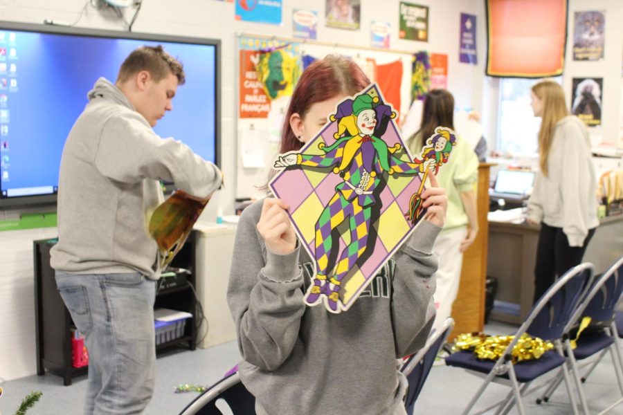 Students decorate for Mardi Gras.