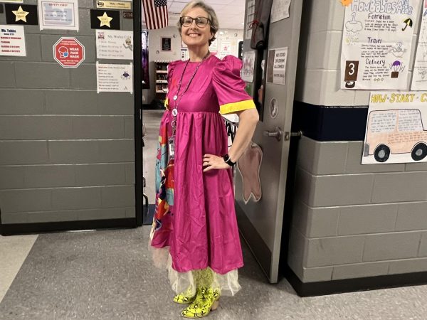 Mrs. Worley dressed as Weird Barbie for todays Movie Character Dress Up Day.